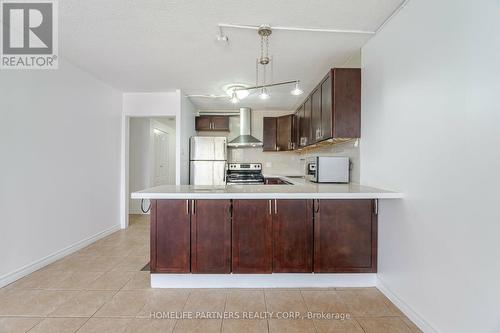 303 - 40 Panorama Court, Toronto (Mount Olive-Silverstone-Jamestown), ON - Indoor Photo Showing Kitchen