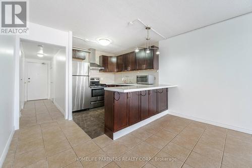 303 - 40 Panorama Court, Toronto (Mount Olive-Silverstone-Jamestown), ON - Indoor Photo Showing Kitchen