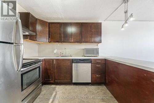 303 - 40 Panorama Court, Toronto (Mount Olive-Silverstone-Jamestown), ON - Indoor Photo Showing Kitchen With Stainless Steel Kitchen