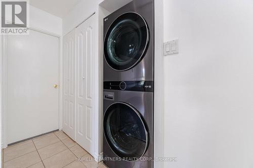 303 - 40 Panorama Court, Toronto (Mount Olive-Silverstone-Jamestown), ON - Indoor Photo Showing Laundry Room