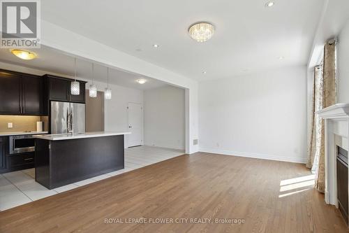 18 Rising Hill Ridge E, Brampton, ON - Indoor Photo Showing Kitchen With Fireplace With Upgraded Kitchen