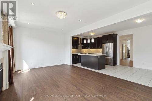 18 Rising Hill Ridge E, Brampton (Bram West), ON - Indoor Photo Showing Kitchen With Fireplace