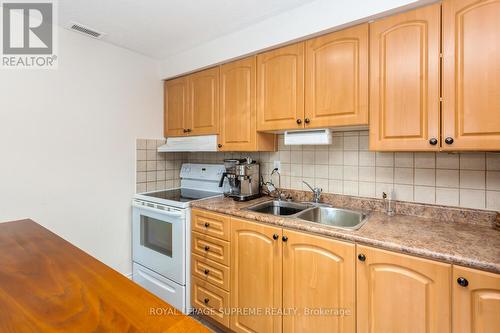 58 Edinborough Court, Toronto, ON - Indoor Photo Showing Kitchen With Double Sink