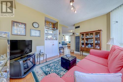 1702 - 1300 Islington Avenue, Toronto, ON - Indoor Photo Showing Living Room