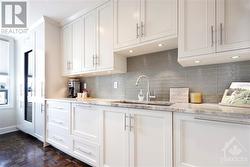 Custom kitchen with panel ready quality appliances. - 