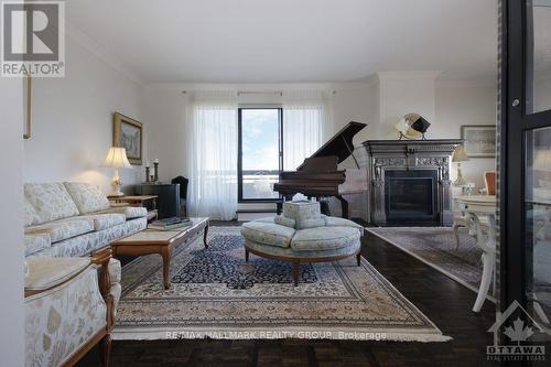 1801 - 20 The Driveway Drive, Ottawa, ON - Indoor Photo Showing Living Room With Fireplace