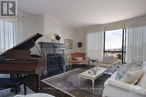 1801 - 20 The Driveway Drive, Ottawa, ON - Indoor Photo Showing Living Room With Fireplace