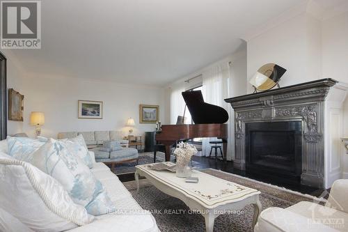 1801 - 20 The Driveway Drive, Ottawa, ON - Indoor Photo Showing Living Room With Fireplace