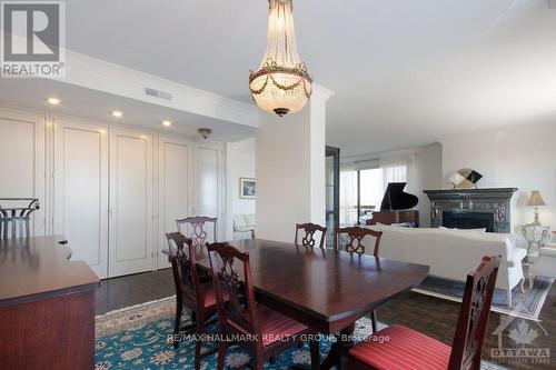 1801 - 20 The Driveway Drive, Ottawa, ON - Indoor Photo Showing Dining Room With Fireplace