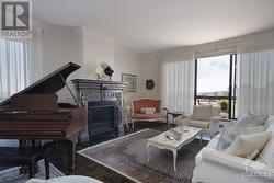 View across living room to South facing balcony. - 