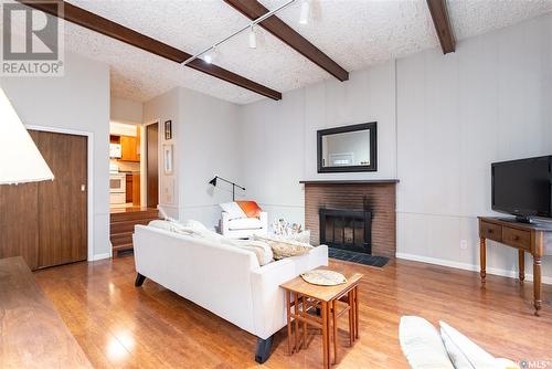 1104 Main Street, Saskatoon, SK - Indoor Photo Showing Living Room With Fireplace