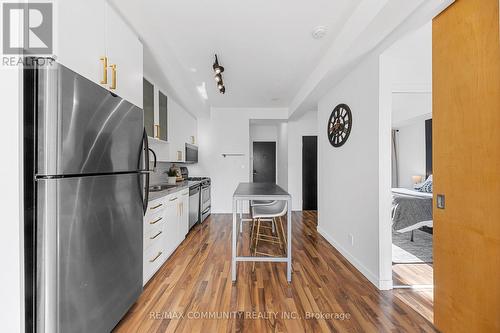 424 - 1 Shaw Street, Toronto, ON - Indoor Photo Showing Kitchen With Stainless Steel Kitchen