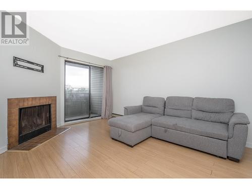 311 615 North Road, Coquitlam, BC - Indoor Photo Showing Living Room With Fireplace