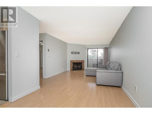 311 615 North Road, Coquitlam, BC - Indoor Photo Showing Living Room With Fireplace