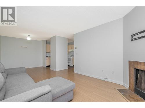 311 615 North Road, Coquitlam, BC - Indoor Photo Showing Living Room With Fireplace