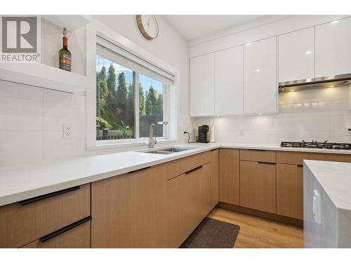 117 3409 Harper Road, Coquitlam, BC - Indoor Photo Showing Kitchen With Double Sink