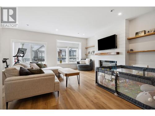 117 3409 Harper Road, Coquitlam, BC - Indoor Photo Showing Living Room With Fireplace