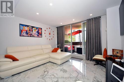 302 - 100 Canyon Avenue, Toronto, ON - Indoor Photo Showing Living Room With Fireplace