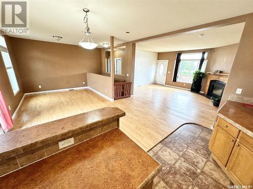 796 Johnston Drive, Weyburn, SK - Indoor With Fireplace