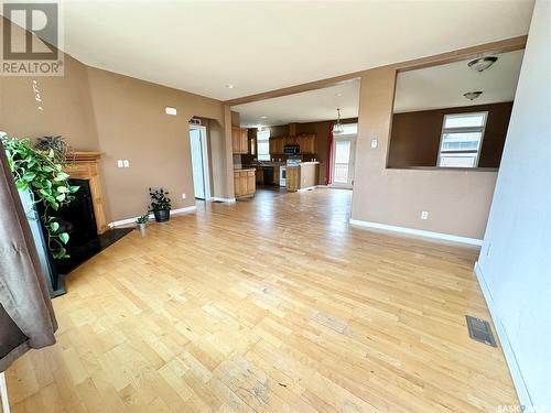 796 Johnston Drive, Weyburn, SK - Indoor Photo Showing Living Room With Fireplace