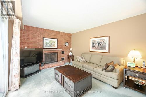 102 Leander Street, Brampton, ON - Indoor Photo Showing Living Room With Fireplace