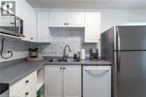 239 East 22Nd Street, Hamilton, ON - Indoor Photo Showing Kitchen With Double Sink