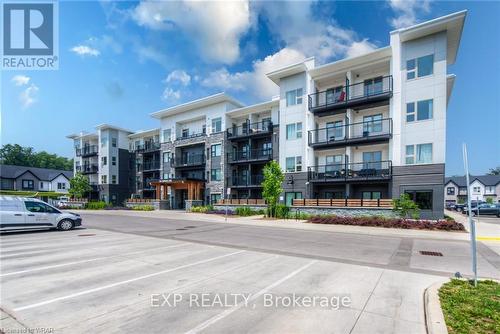 438 - 110 Fergus Avenue, Kitchener, ON - Outdoor With Balcony With Facade