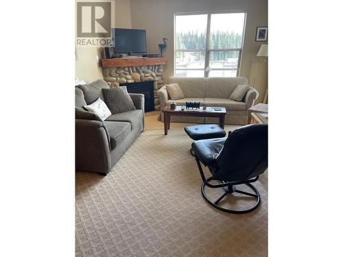 9802 Silver Star Road Unit# 204, Silver Star, BC - Indoor Photo Showing Living Room With Fireplace