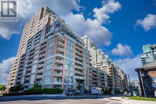 612 - 65 East Liberty Street, Toronto (Niagara), ON - Outdoor With Balcony With Facade