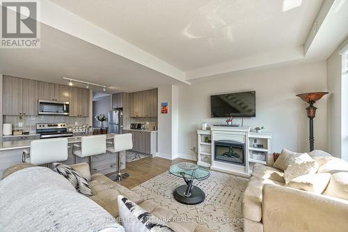 12 - 1245 Bayly Street, Pickering, ON - Indoor Photo Showing Living Room With Fireplace