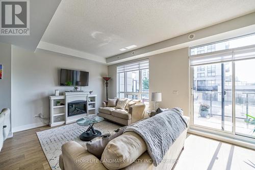 12 - 1245 Bayly Street, Pickering, ON - Indoor Photo Showing Living Room With Fireplace