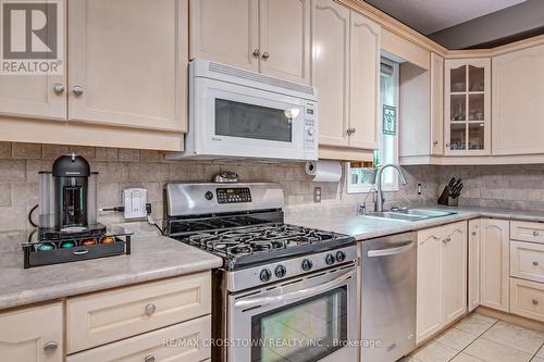 19 Mccarthy Court, Barrie, ON - Indoor Photo Showing Kitchen With Double Sink