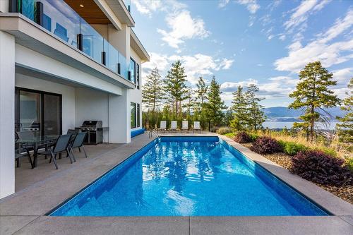 980 Ledgeview Court, Kelowna, BC - Outdoor With In Ground Pool With Deck Patio Veranda