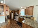 27 7817 S 97 Highway, Prince George, BC  - Indoor Photo Showing Kitchen With Double Sink 