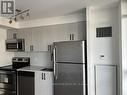 1001 - 38 Joe Shuster Way, Toronto, ON  - Indoor Photo Showing Kitchen With Stainless Steel Kitchen 