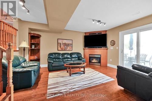 112 Redfern Avenue, Hamilton, ON - Indoor Photo Showing Living Room With Fireplace