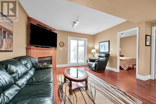 112 Redfern Avenue, Hamilton, ON - Indoor Photo Showing Living Room With Fireplace