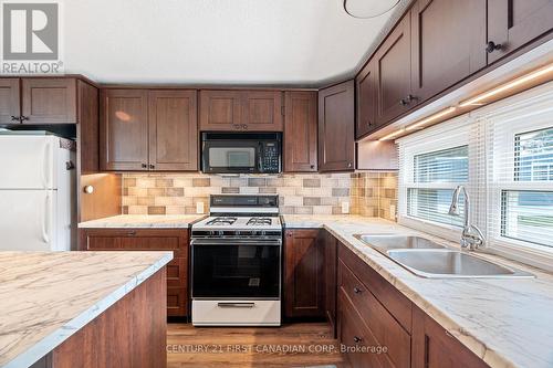 48 Starlit Lane, Bluewater (Zurich), ON - Indoor Photo Showing Kitchen With Double Sink