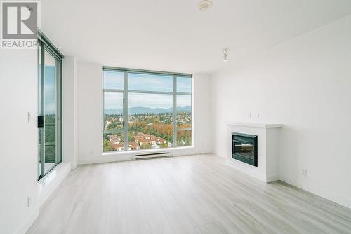 2506 280 Ross Drive, New Westminster, BC - Indoor Photo Showing Living Room With Fireplace