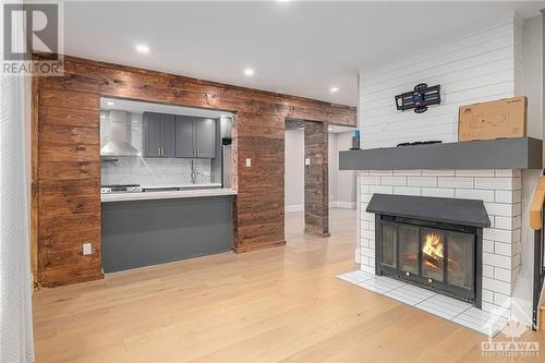 1834 D'Amour Crescent, Ottawa, ON - Indoor Photo Showing Living Room With Fireplace