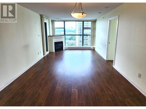 1805 4398 Buchanan Street, Burnaby, BC - Indoor Photo Showing Other Room With Fireplace