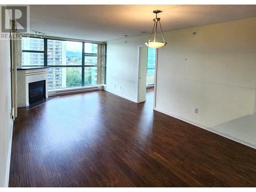 1805 4398 Buchanan Street, Burnaby, BC - Indoor Photo Showing Other Room With Fireplace