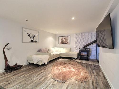 Family room - 1537 Rue Labelle, Val-D'Or, QC - Indoor Photo Showing Living Room With Fireplace