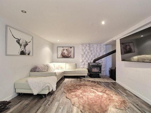 Family room - 1537 Rue Labelle, Val-D'Or, QC - Indoor Photo Showing Living Room With Fireplace