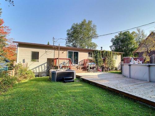 Back facade - 1537 Rue Labelle, Val-D'Or, QC - Outdoor With Above Ground Pool