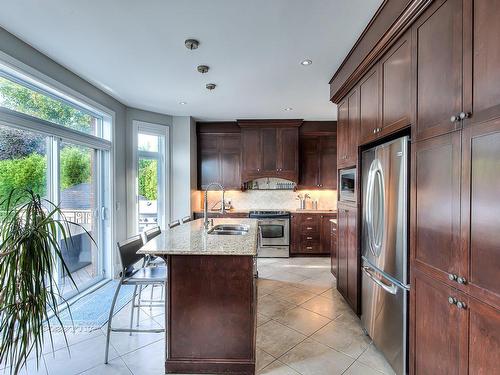 Kitchen - 412 Rue Des Alismas, Laval (Sainte-Dorothée), QC - Indoor Photo Showing Kitchen With Double Sink With Upgraded Kitchen