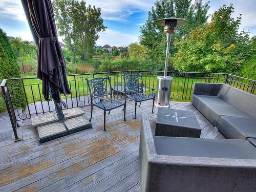 Backyard - 412 Rue Des Alismas, Laval (Sainte-Dorothée), QC - Outdoor With Deck Patio Veranda With Exterior