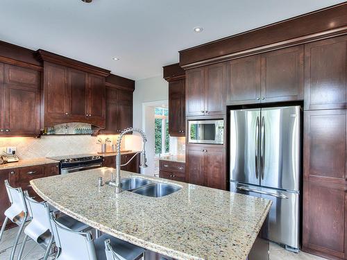 Kitchen - 412 Rue Des Alismas, Laval (Sainte-Dorothée), QC - Indoor Photo Showing Kitchen With Double Sink With Upgraded Kitchen