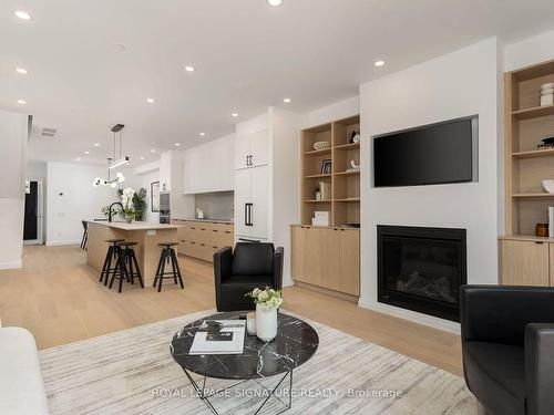 8 Dartnell Ave, Toronto, ON - Indoor Photo Showing Living Room With Fireplace