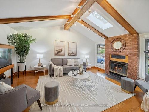 14 Macklingate Crt, Toronto, ON - Indoor Photo Showing Living Room With Fireplace